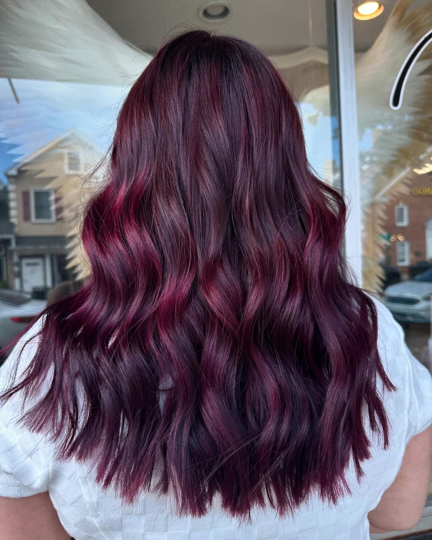 dark burgundy hair with highlights