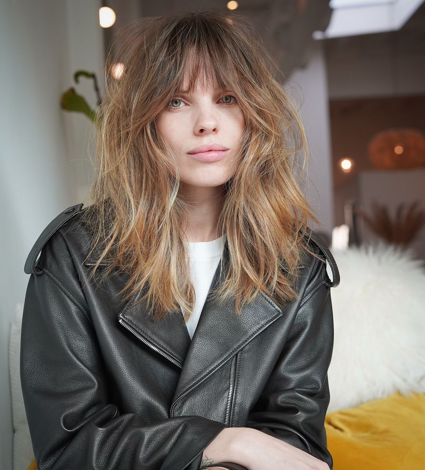 layered shoulder-length cut with bangs