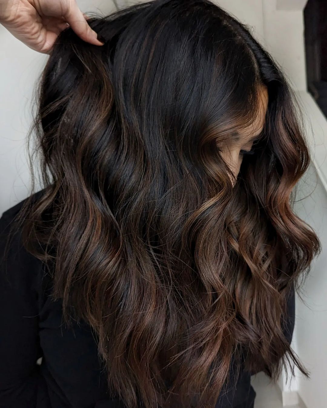 dark dimensional hair with caramel accents