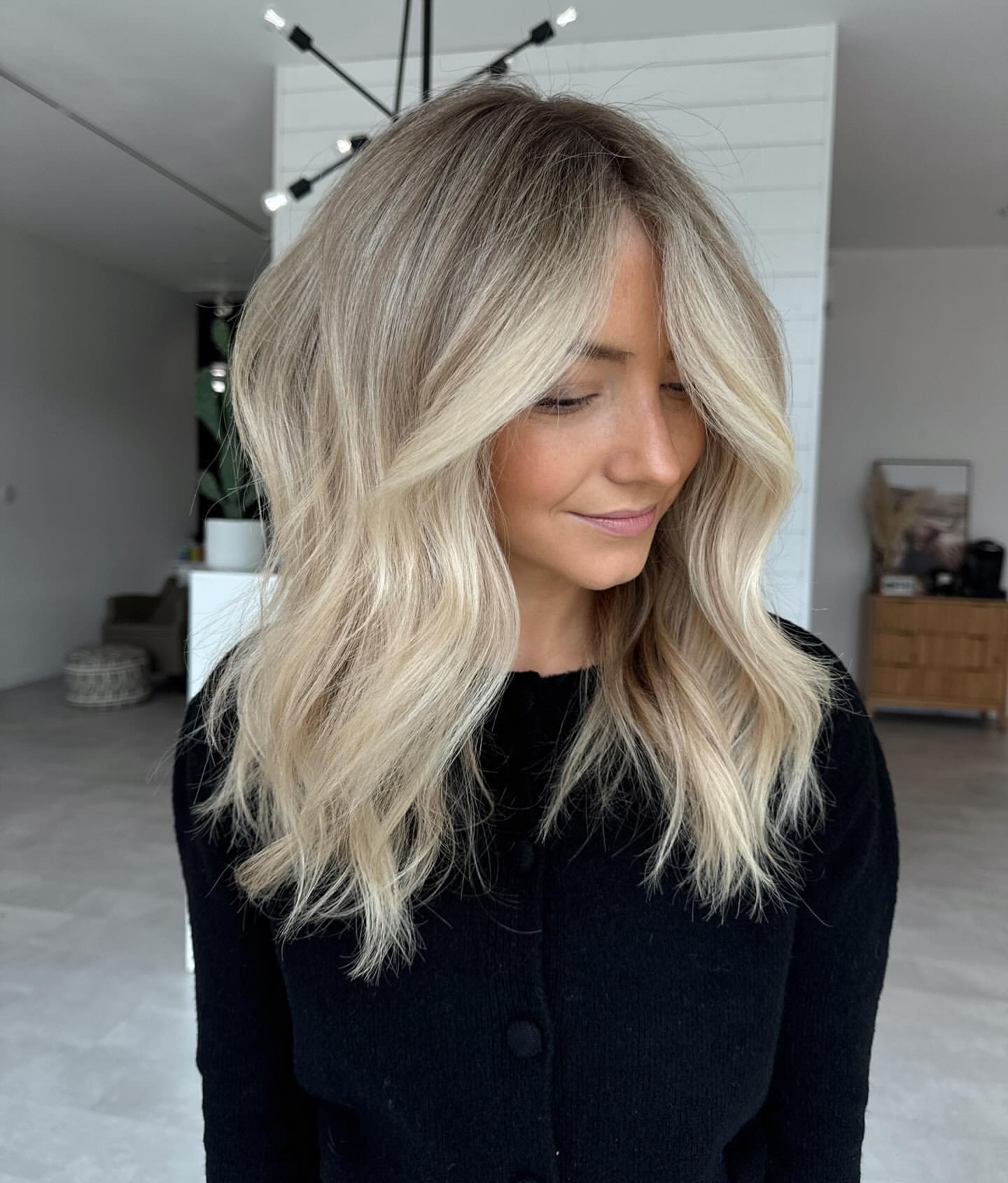 face-framing blonde highlights with subtle lowlights