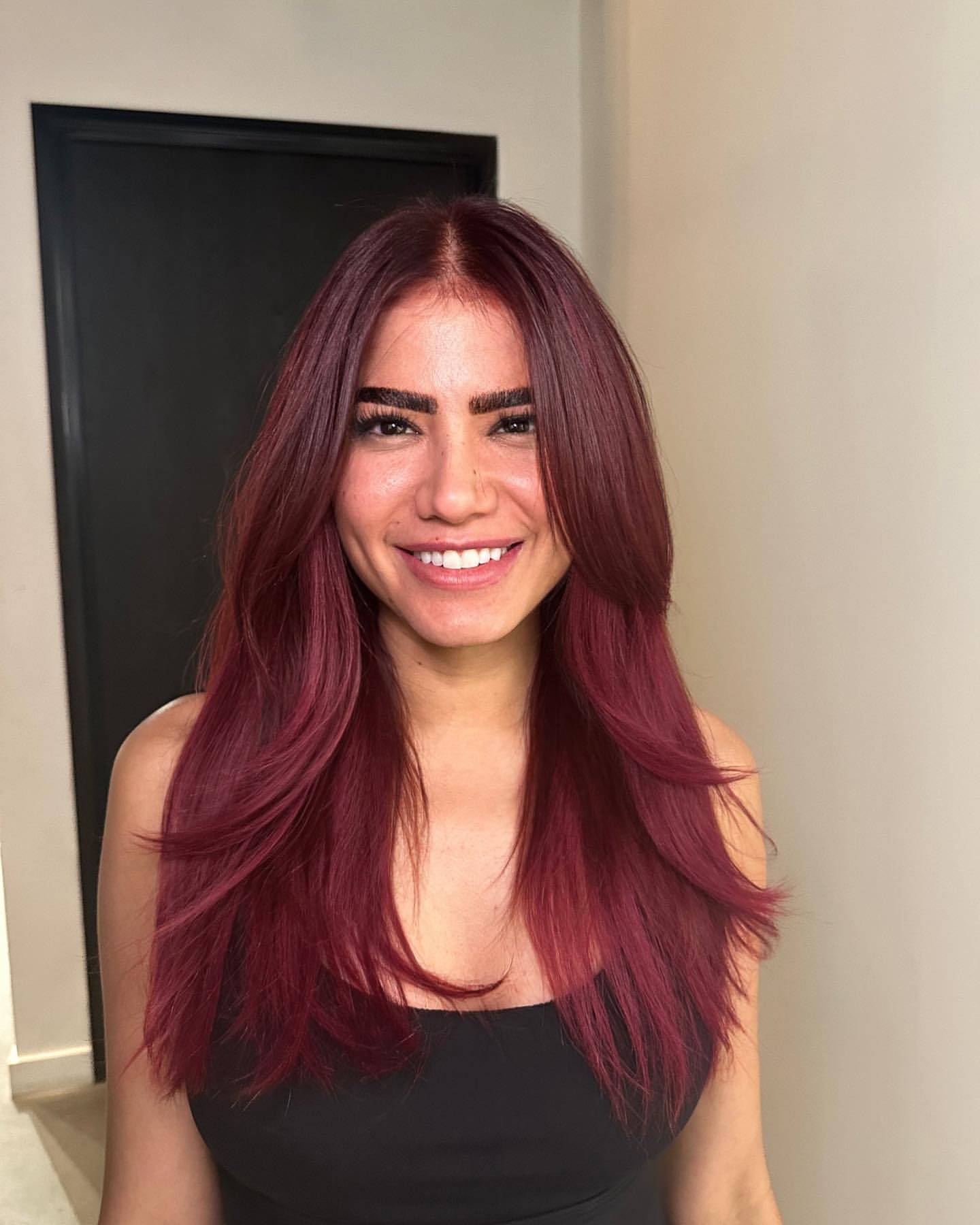 layered deep cherry red hair