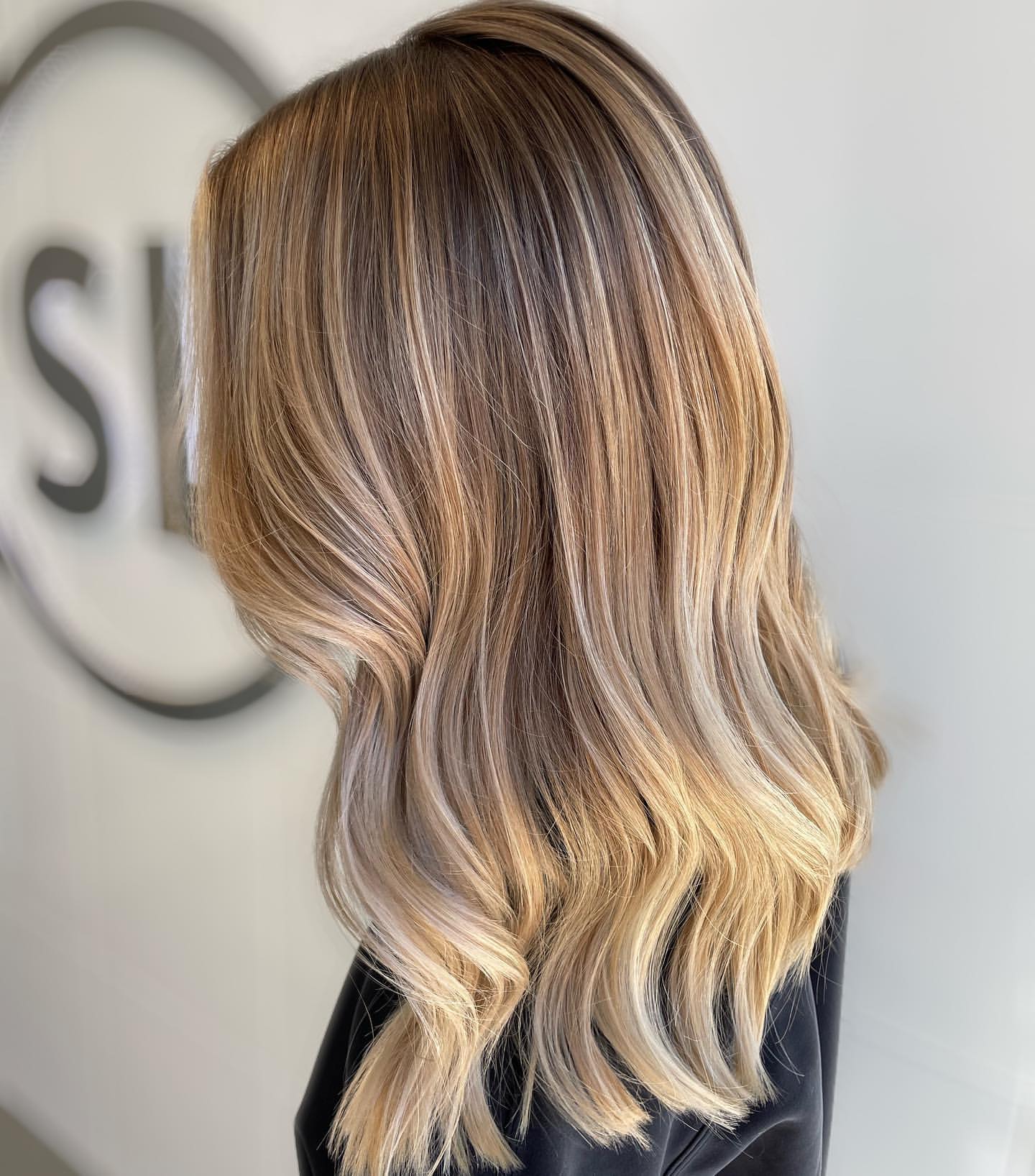 creamy blonde highlights with soft caramel lowlights