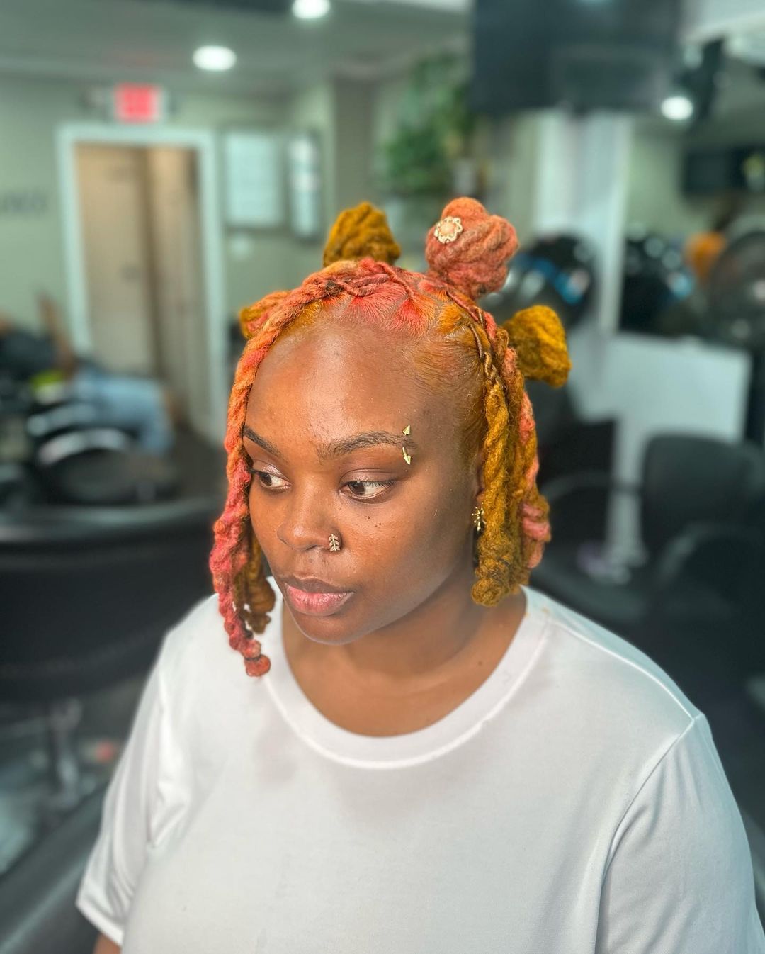 Bantu Knots With An Asymmetrical Bob