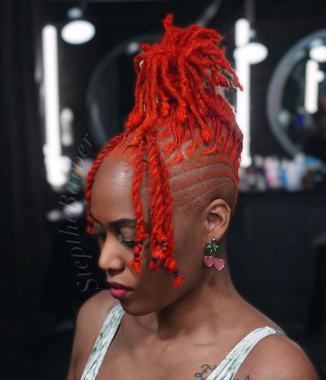 Lava Red Braids With Stripe Shaved Sides