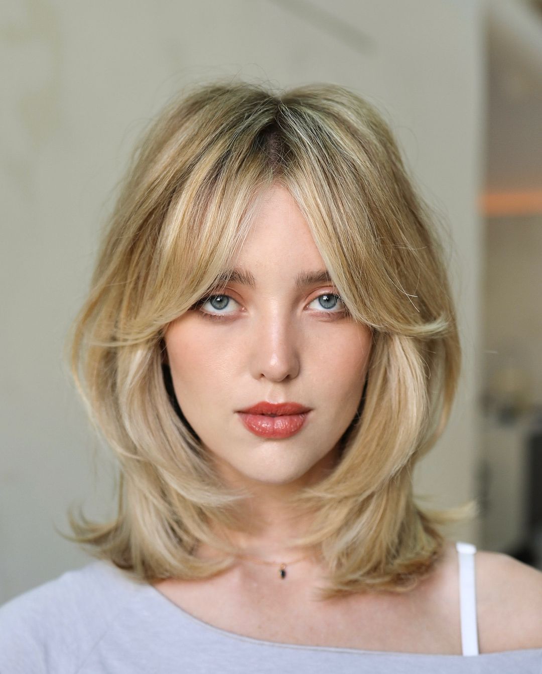 retro layered hair with bangs blowout