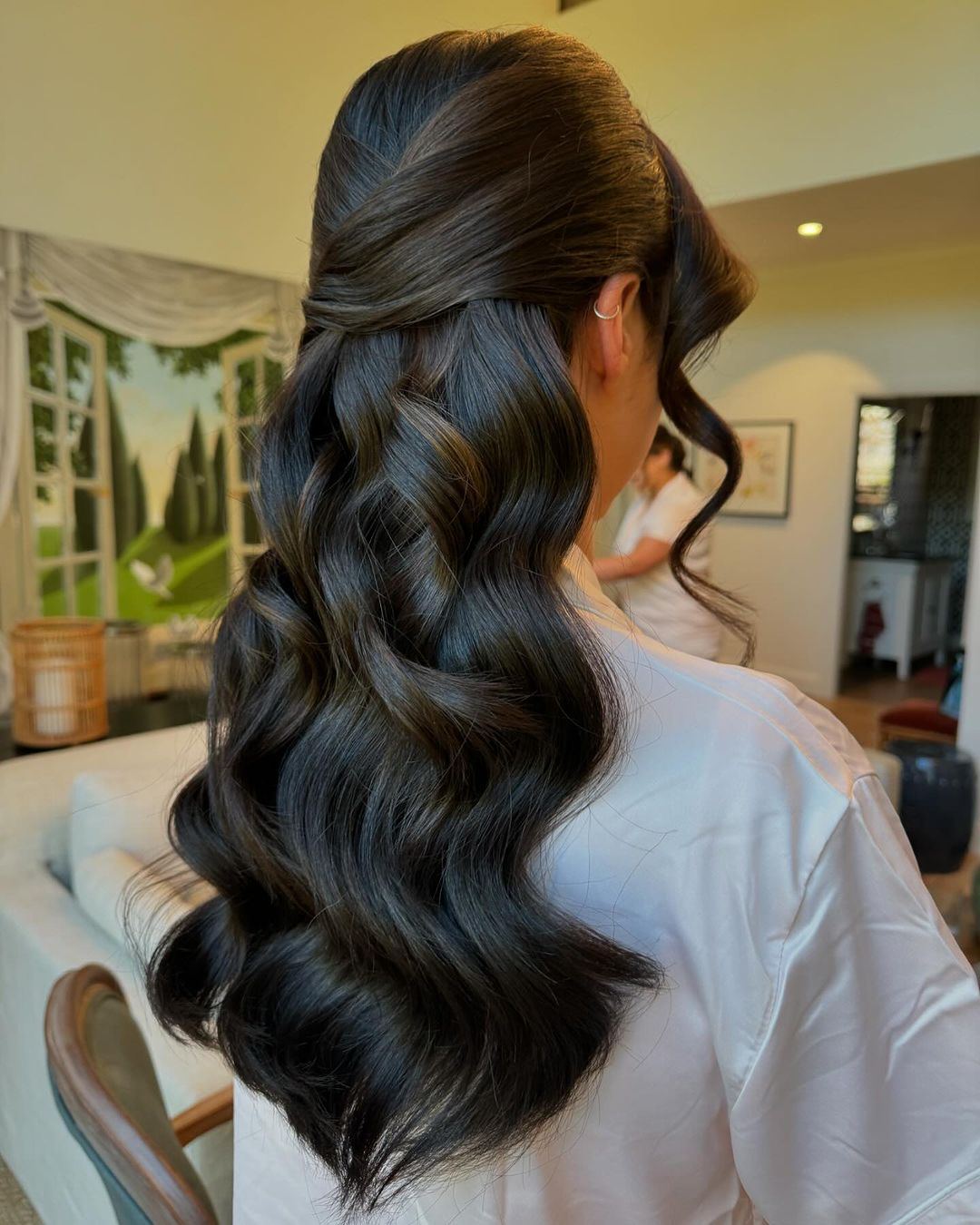 penteado encaracolado com nó elegante