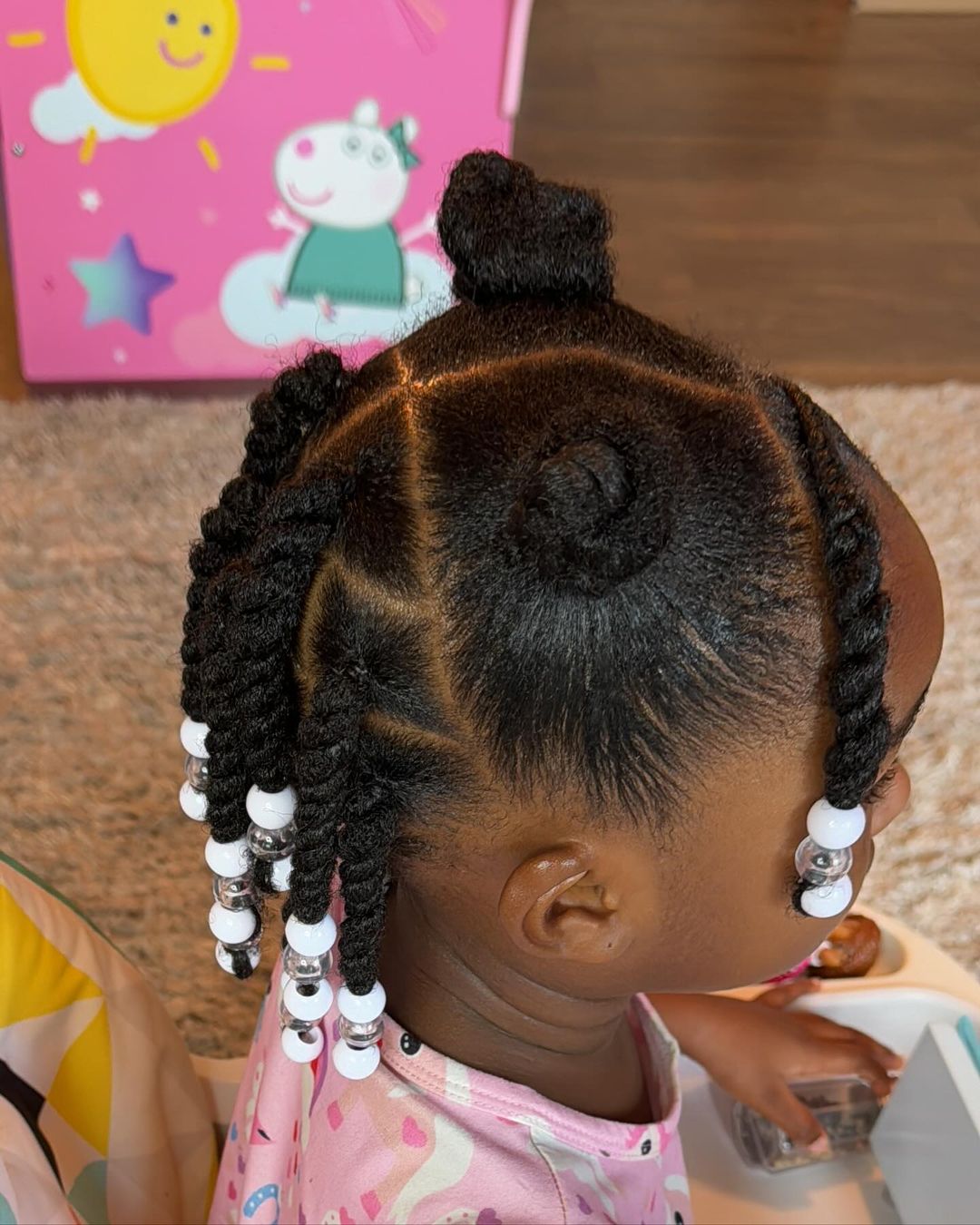 penteado com nó bantu