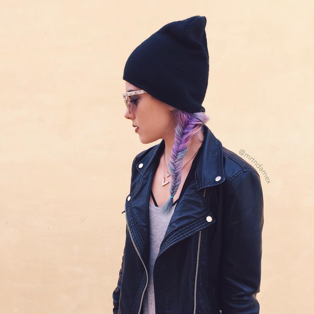 beanie with a side fishtail braid