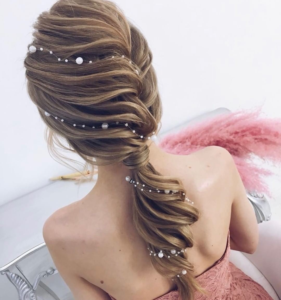 braided loose ponytail with pearls