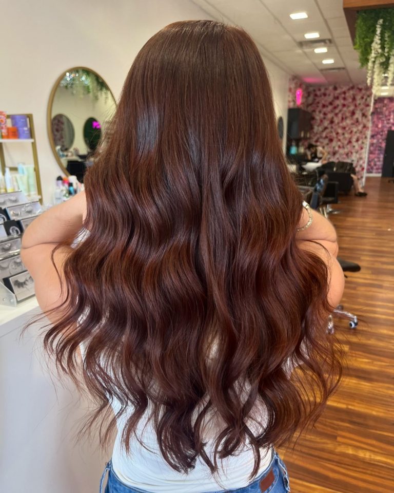 Dark Brown Hair With Red Undertones Is The Hottest WarmedUp Style Of 2025