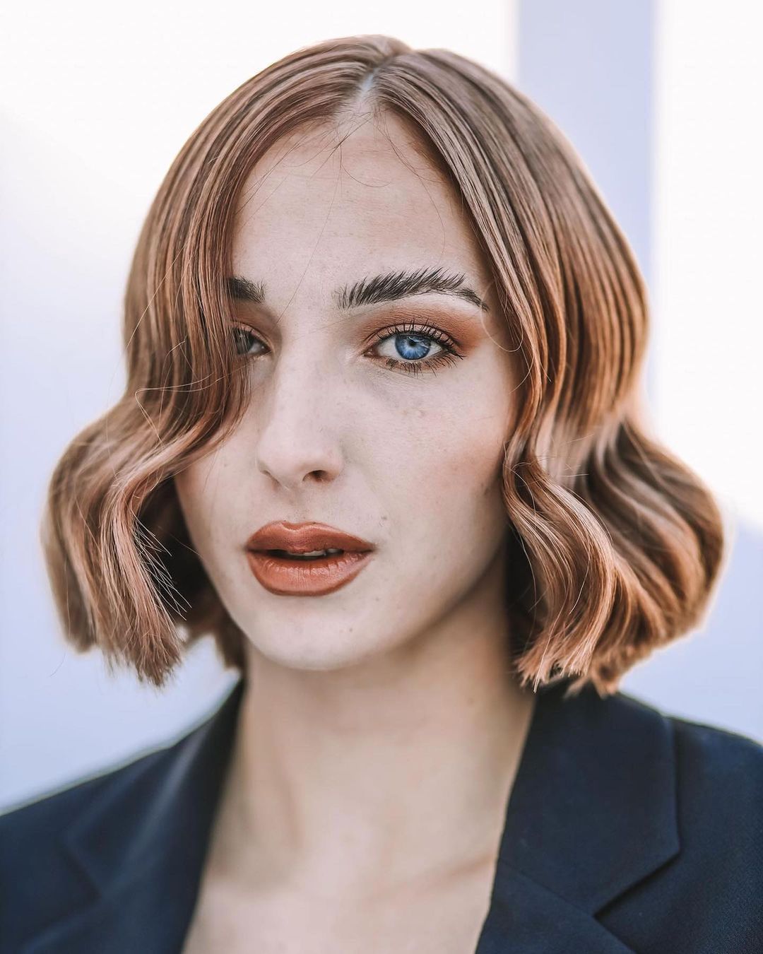 dark amber blonde bob blunt cut