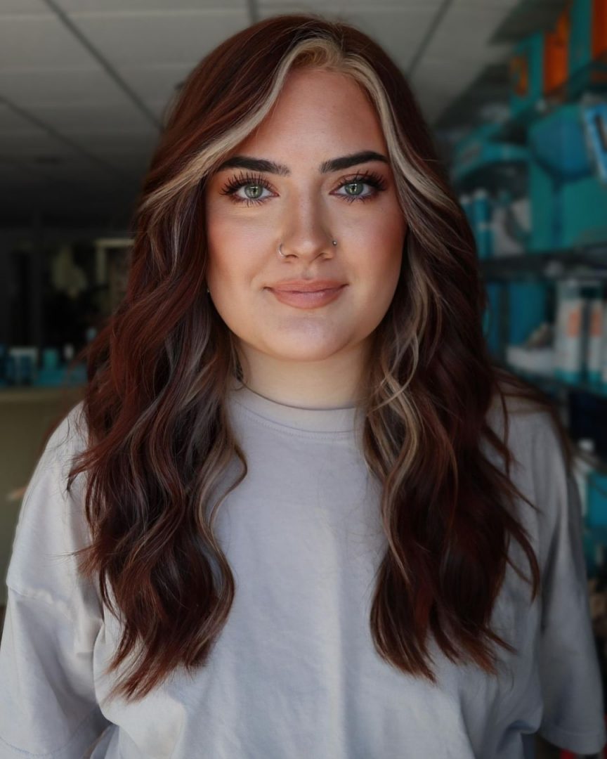 Dark Brown Hair With Red Undertones Is The Hottest WarmedUp Style Of 2025