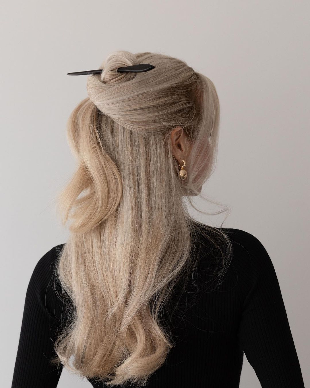 half updo with a hair stick