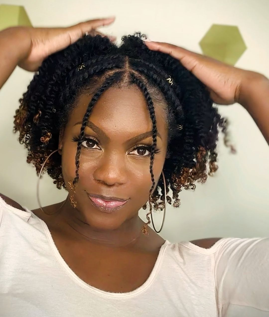 natural coily hair with front twists and beads