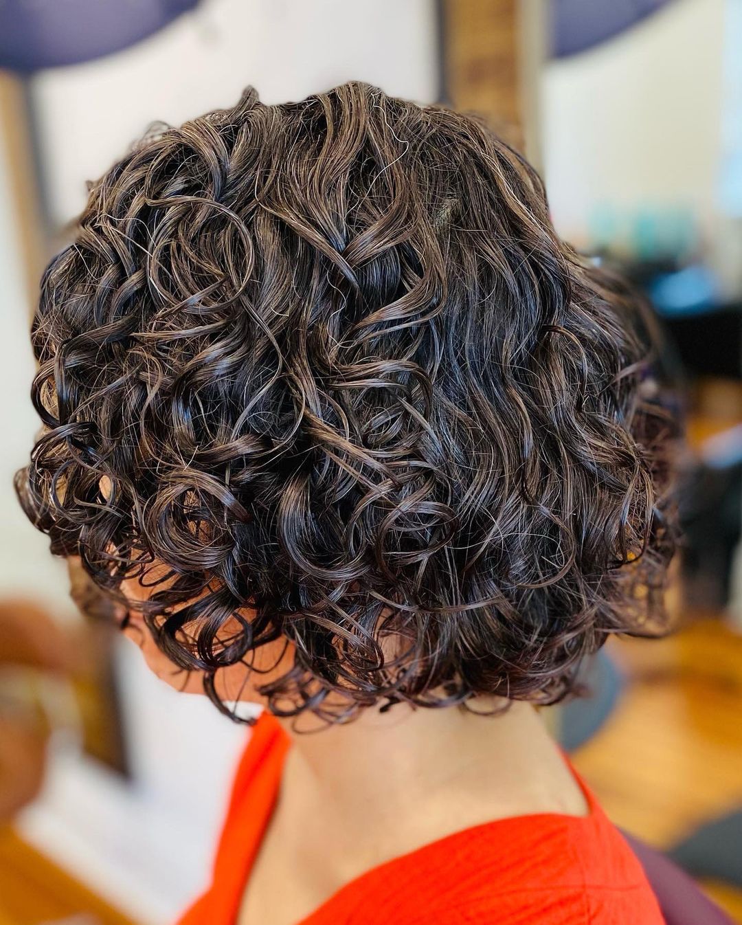 round stacked curly bob