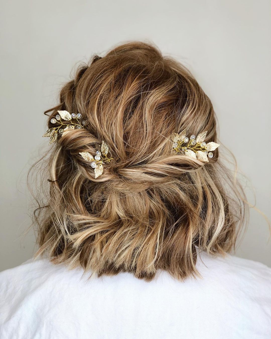 short half-up twist with hair clips