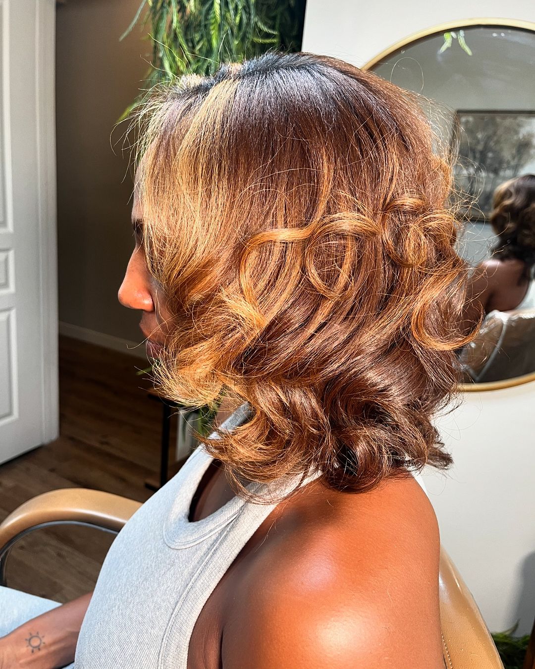 soft curled blowout on short hair