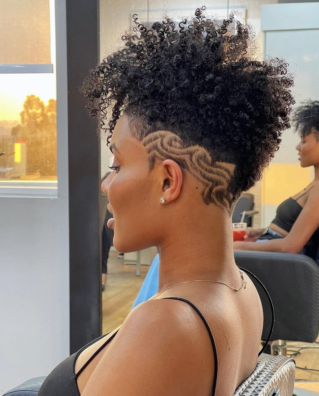 tapered cut for afro hair with freestyle lines