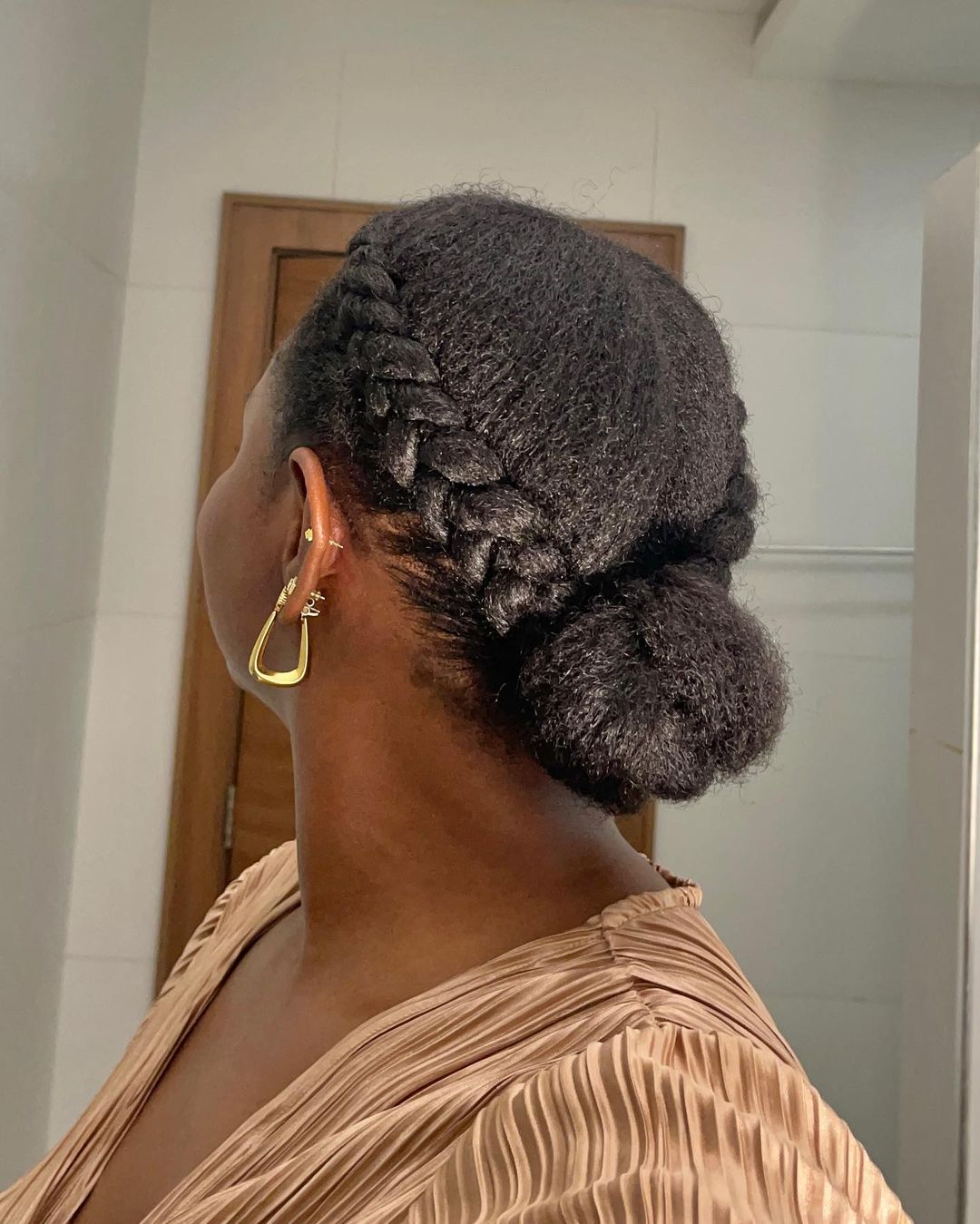 two side braids into a low bun