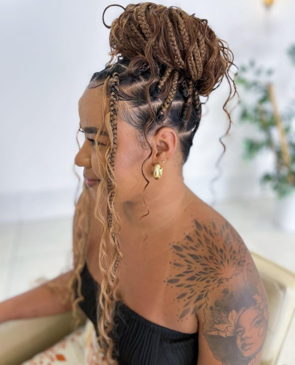 Big Bun With Medium Braids