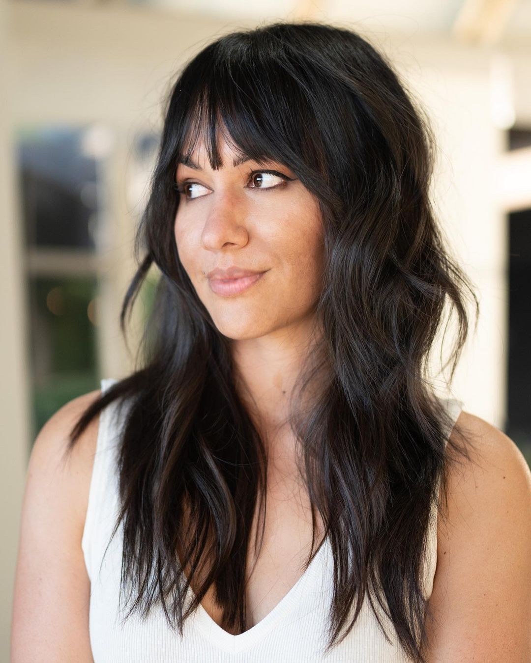 choppy shag with wispy bangs