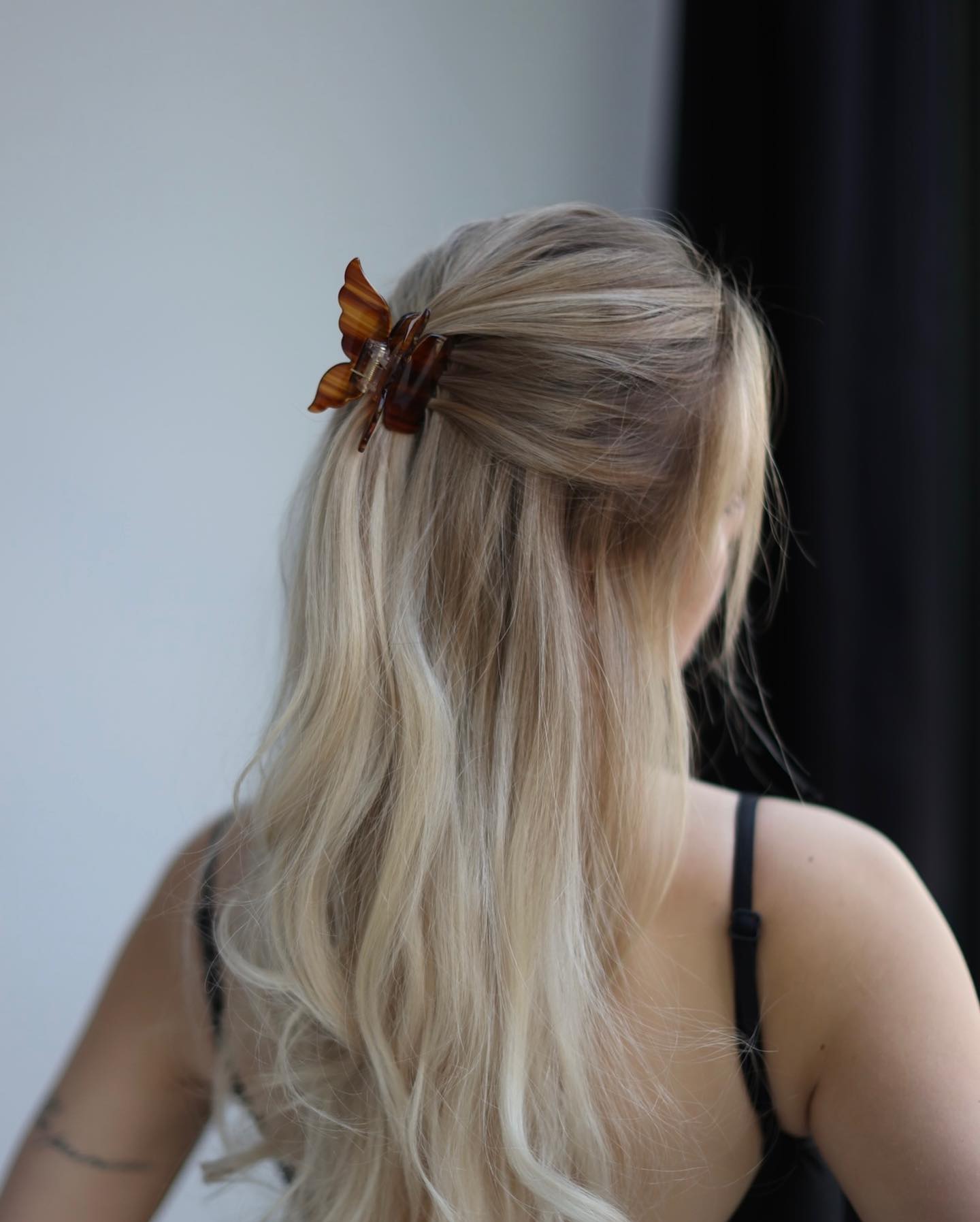 half up half down with small hair clip