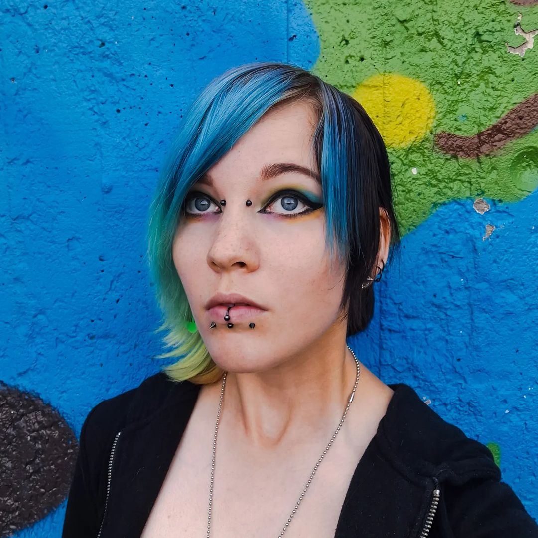 Asymmetrical Short Haircut With Green And Blue Shades