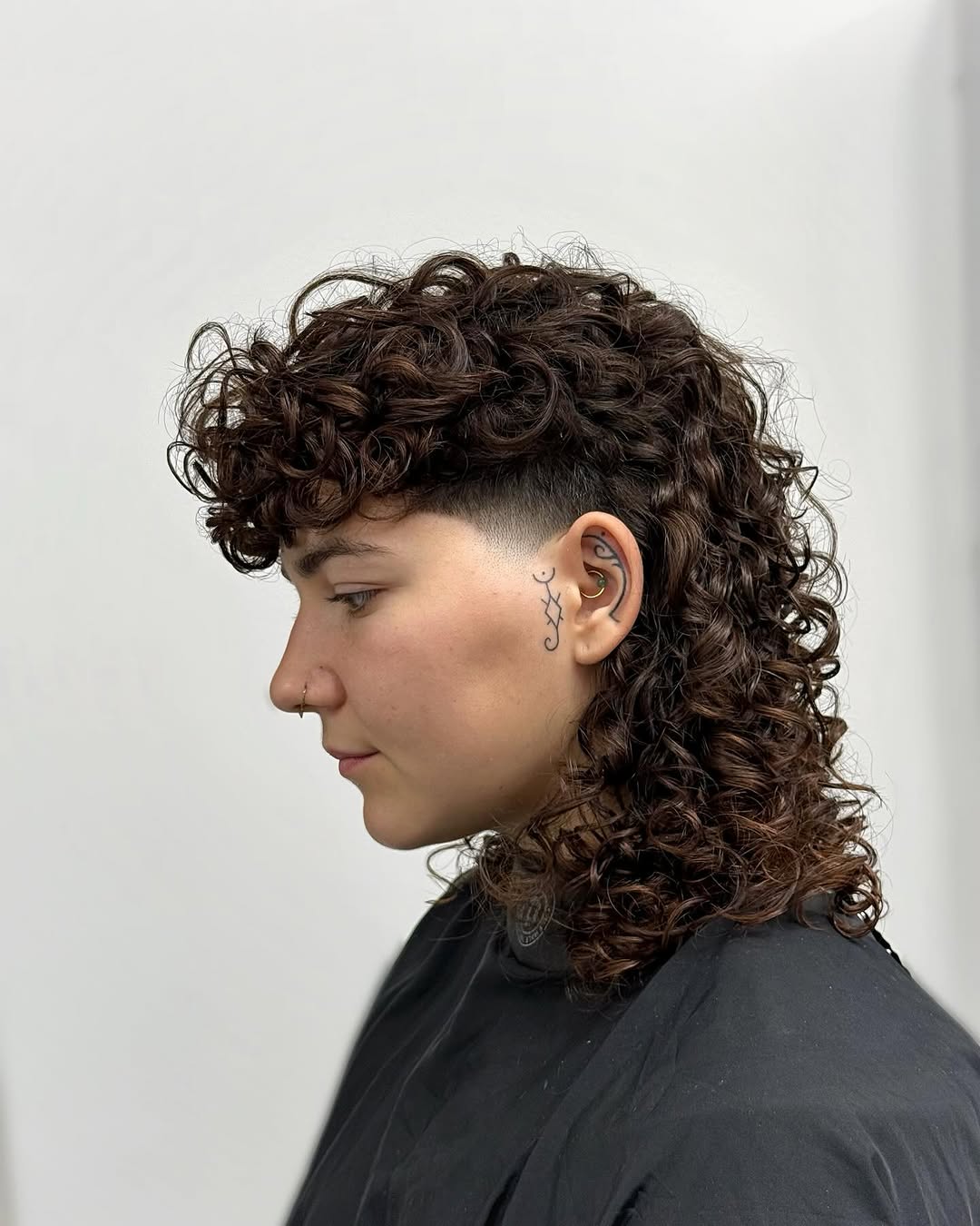 Curly Mullet With A Subtle Undercut