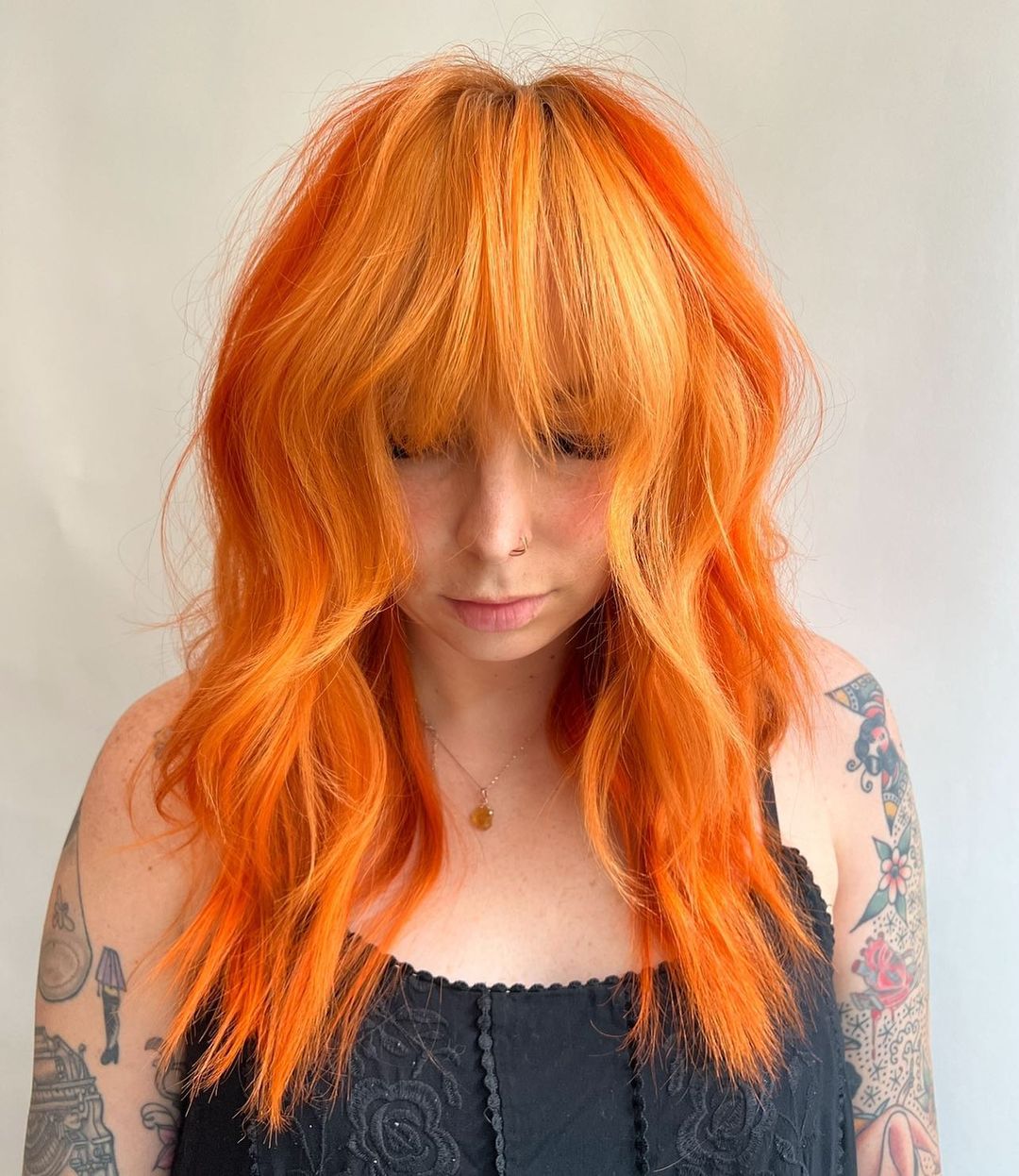 electric cowboy copper hair with bangs