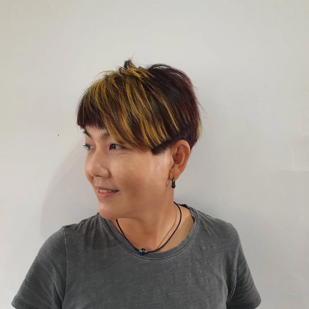 Pixie Cut With Yellow Highlights 