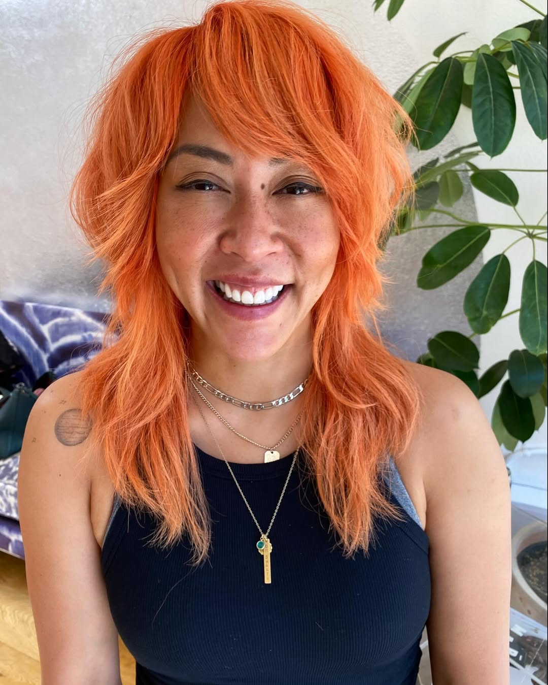 Vivid Orange Shag With 2000 Side Bangs