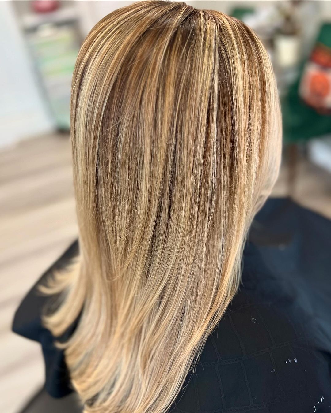 gemengd blond haar met koperen lowlights