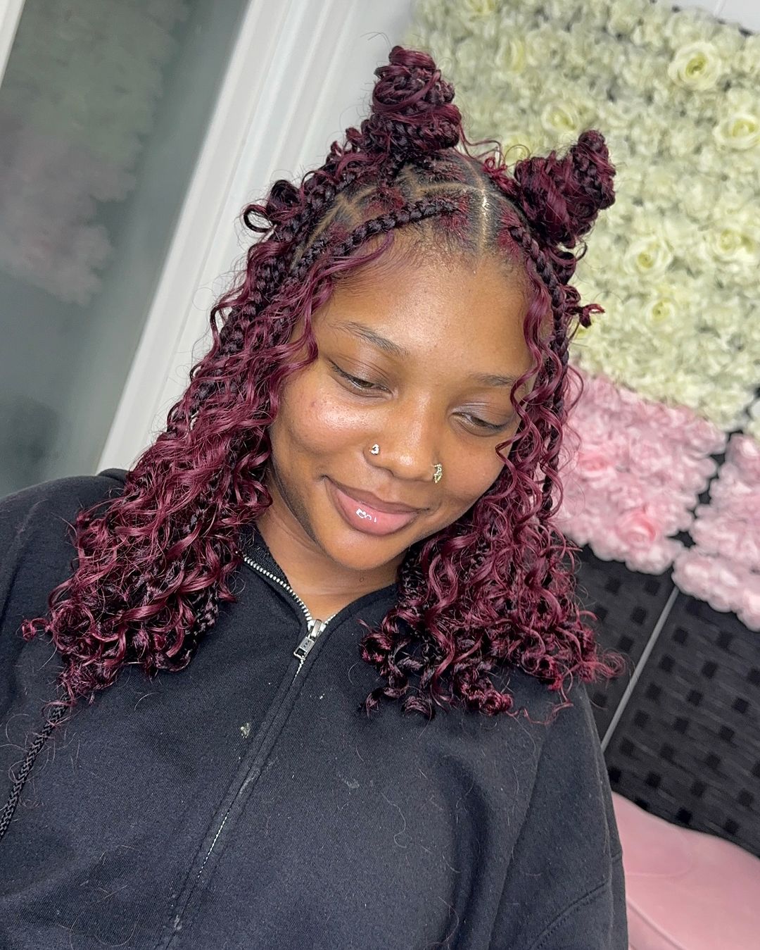 burgundy knotless braids in space buns