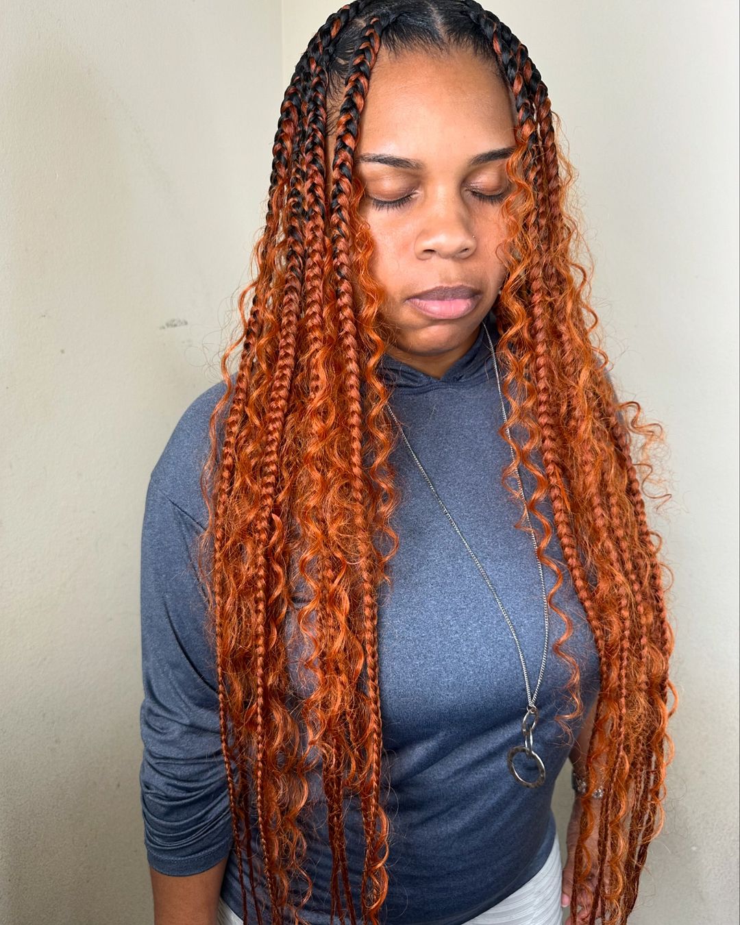 copper knotless box braids with dark roots