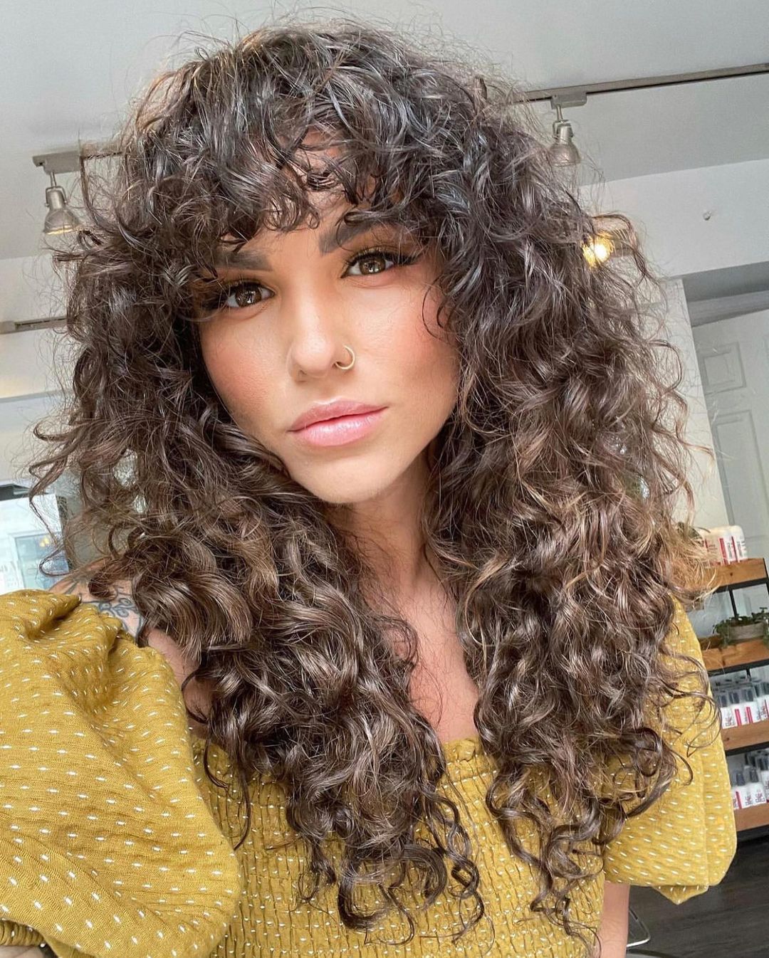 curly bangs with layered curls