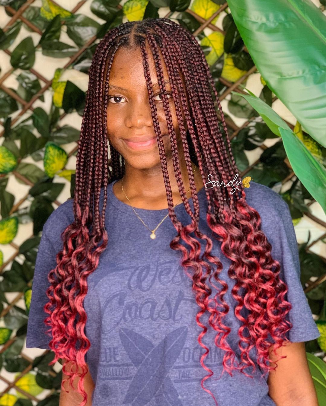 curly burgundy box braids