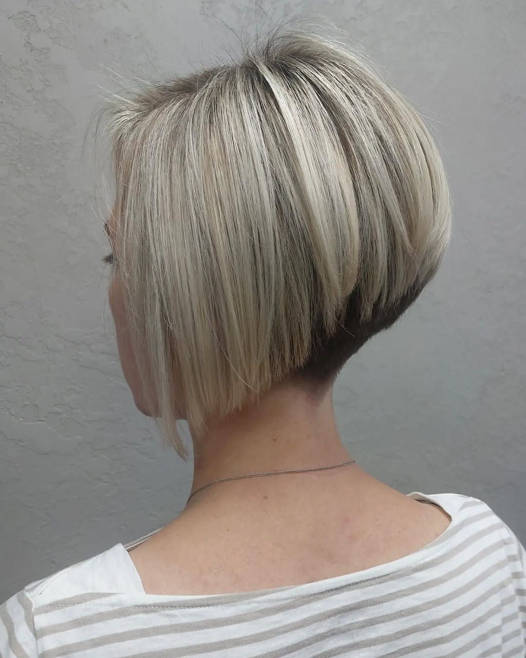 dimensional blonde layered stacked bob