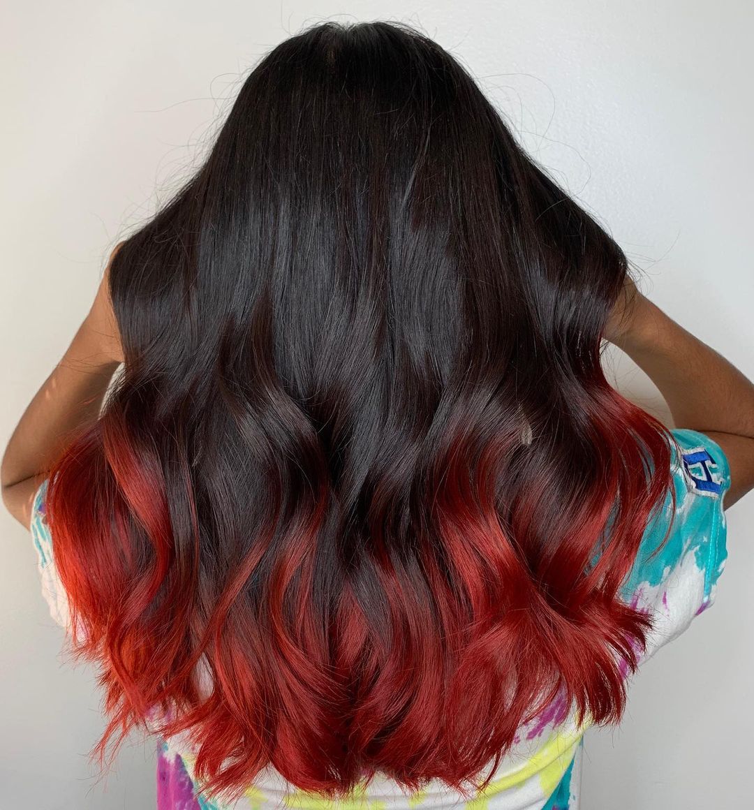 fiery red ombre on black hair