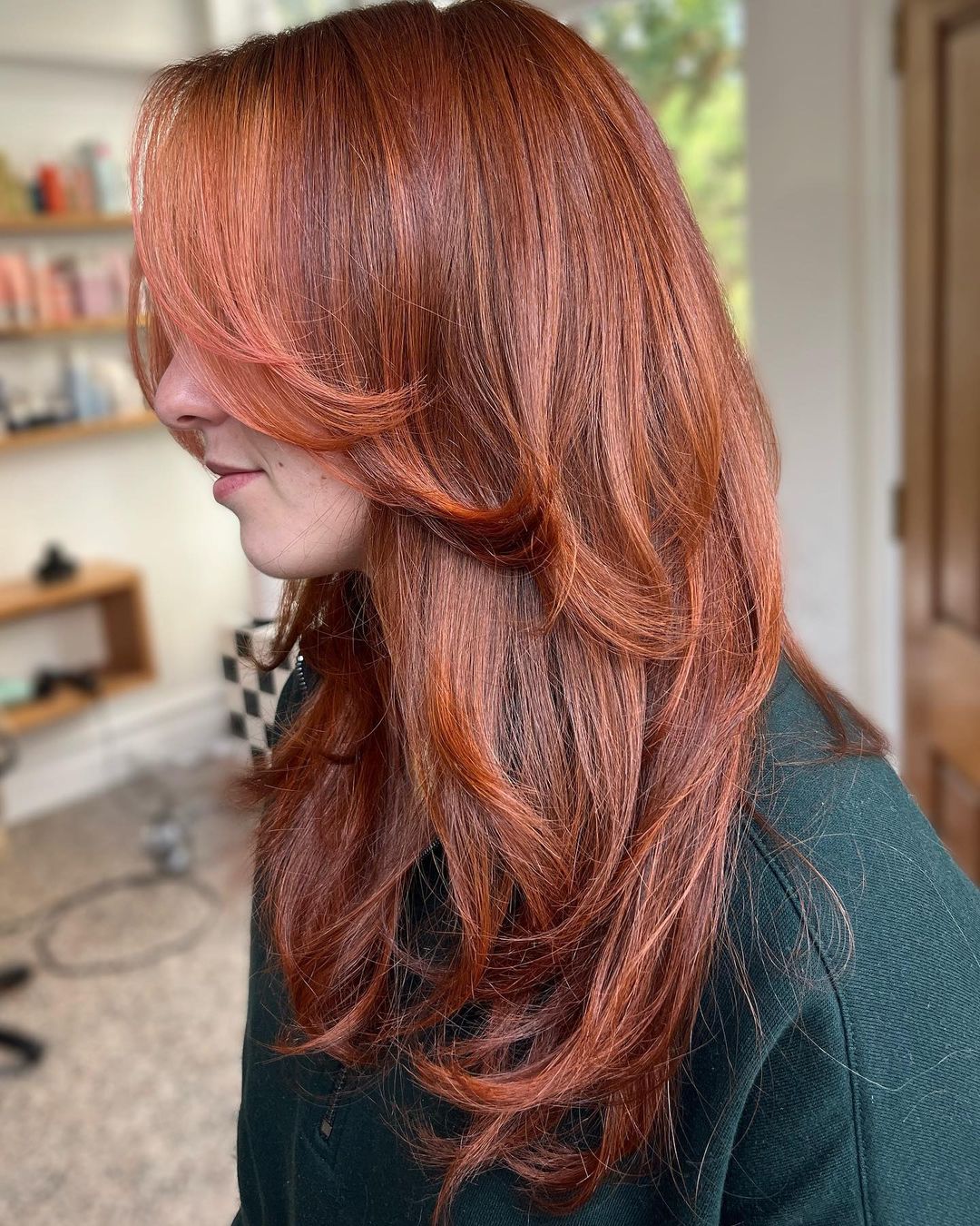 ginger copper with curtain bangs