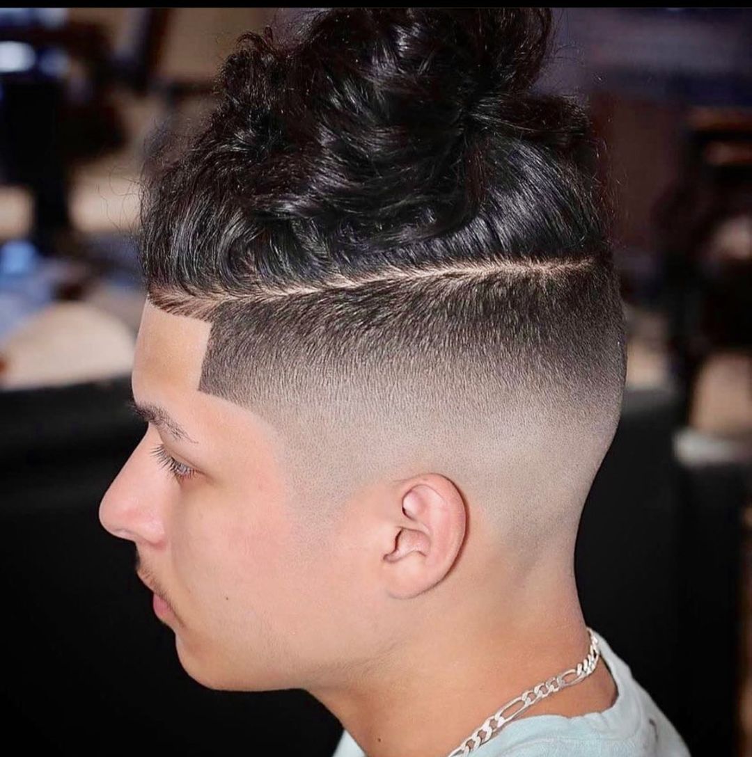 high taper fade man bun