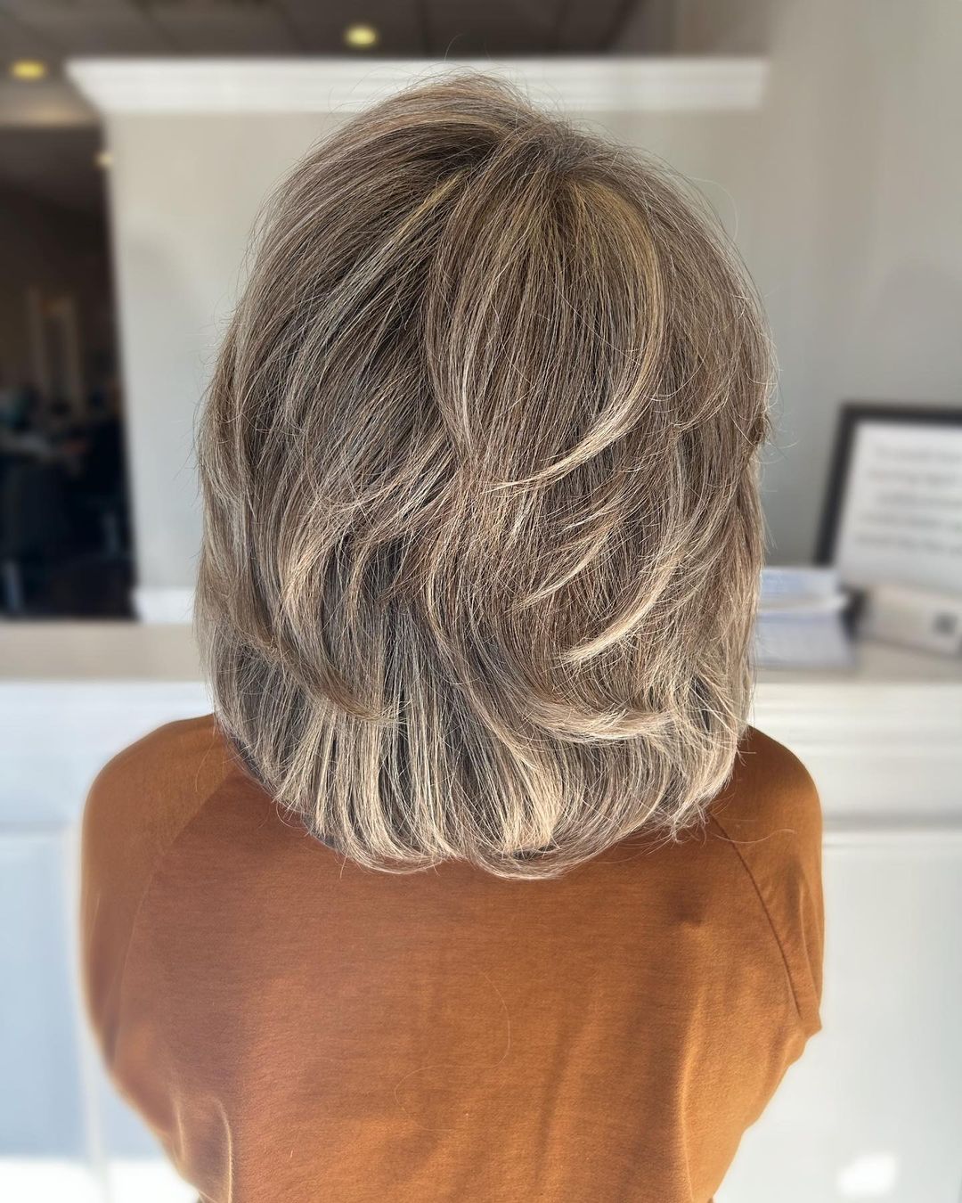 layered long bob for women over 60