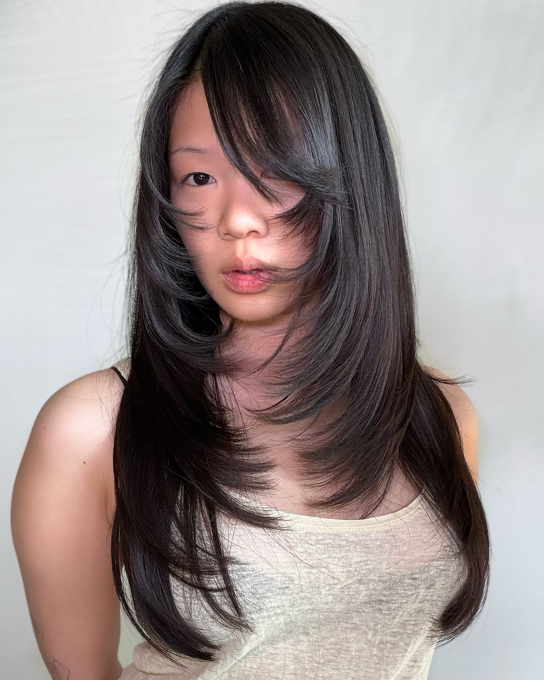 side bangs with face-framing layers