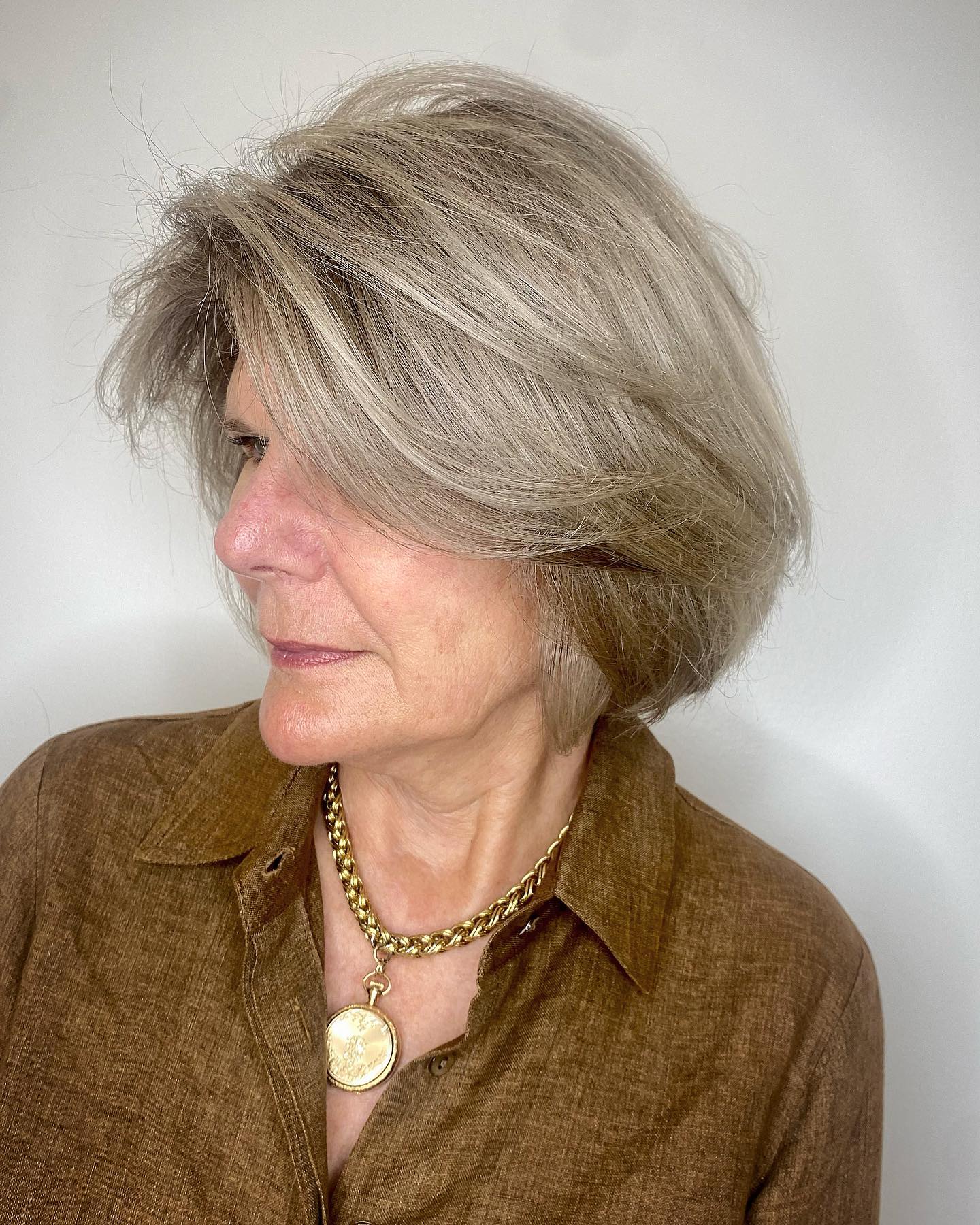 side parted bob with layers for women over 60