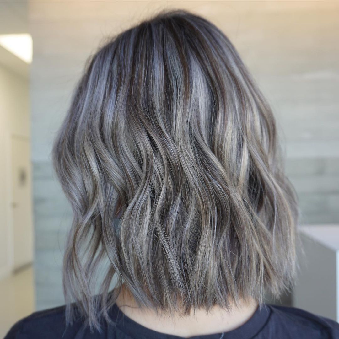 zilveren balayage op golvende lob