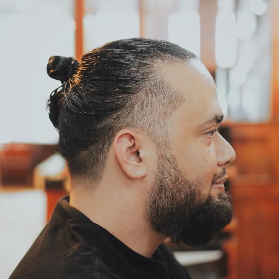 sleek man bun fade