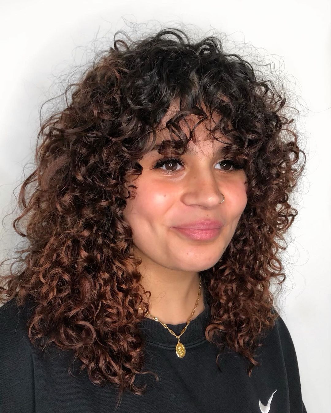 spiral perm shag haircut