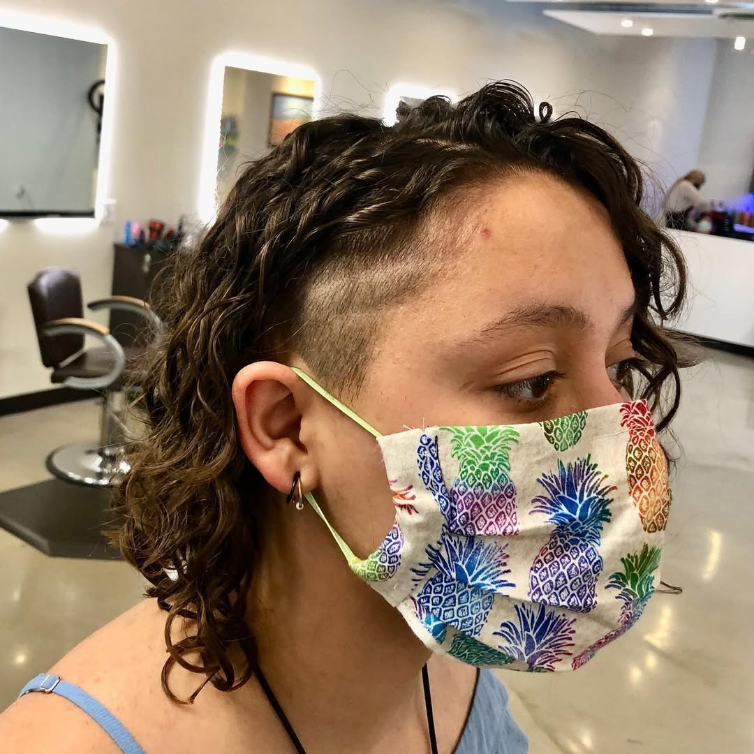 spiral perm with an undercut