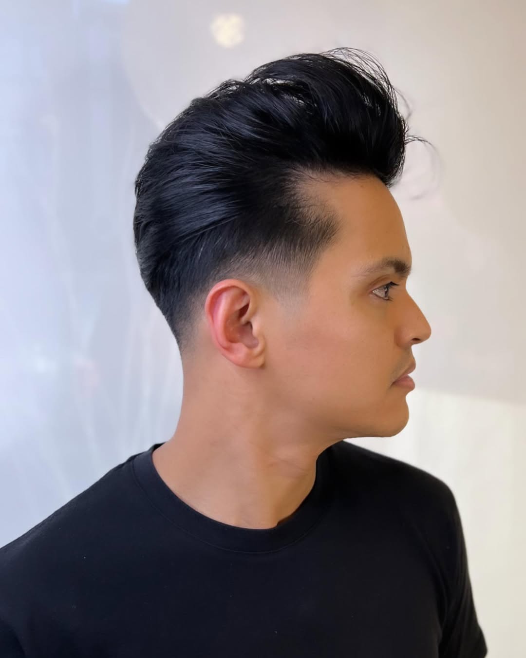 ultra-voluminous quiff with tapered sides