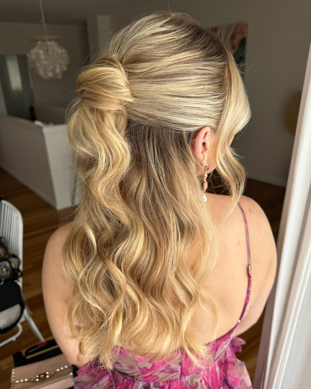 wavy half up ponytail bun