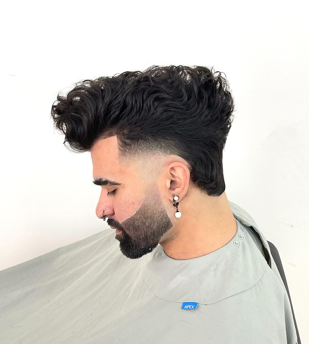 wavy quiff with low taper